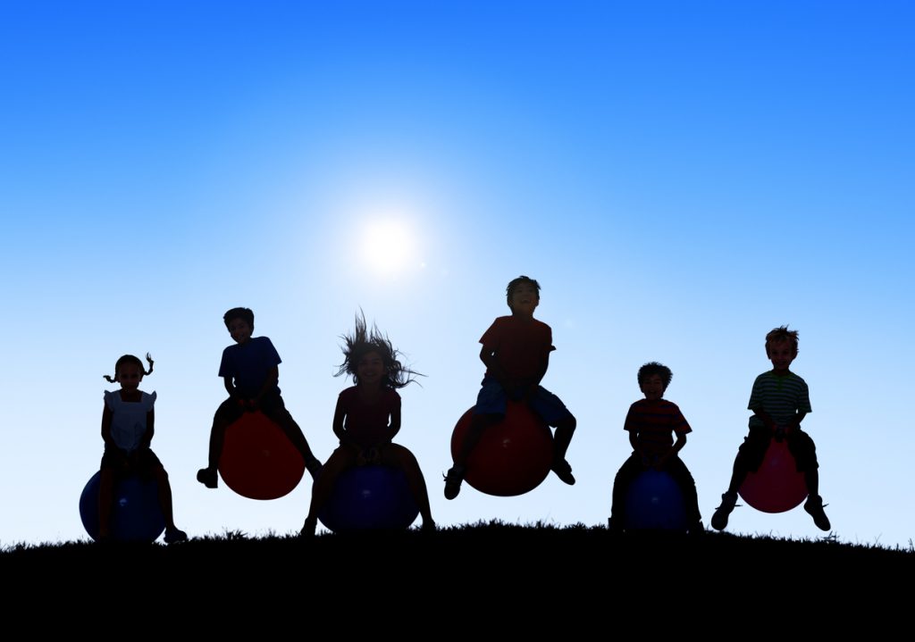 Silhouettes of kids Playing