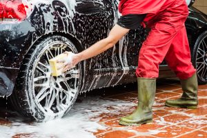 How To Keep Your Honda Clean - Man washing the exterior of a car