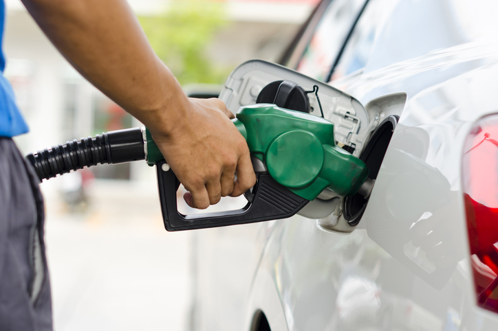 Refueling Car With Gasoline Pump Nozzle